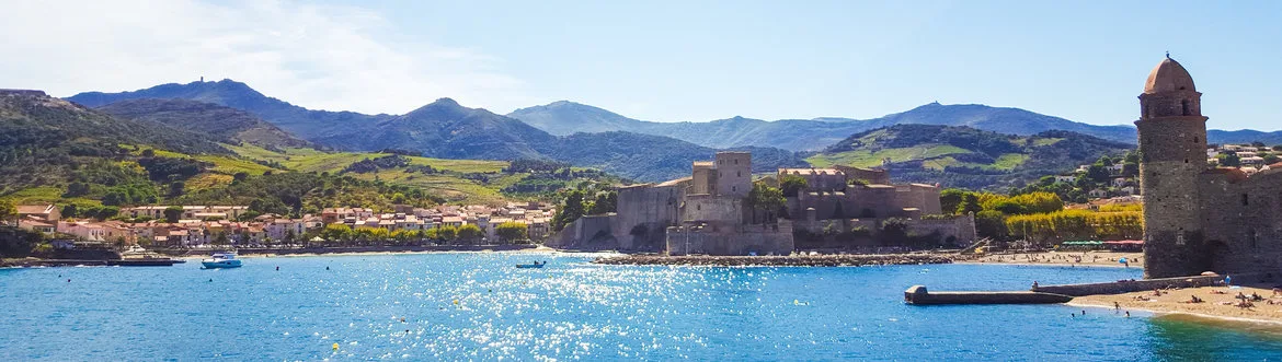 Beautiful view on the bay of Collioure with Pyrenees in the background