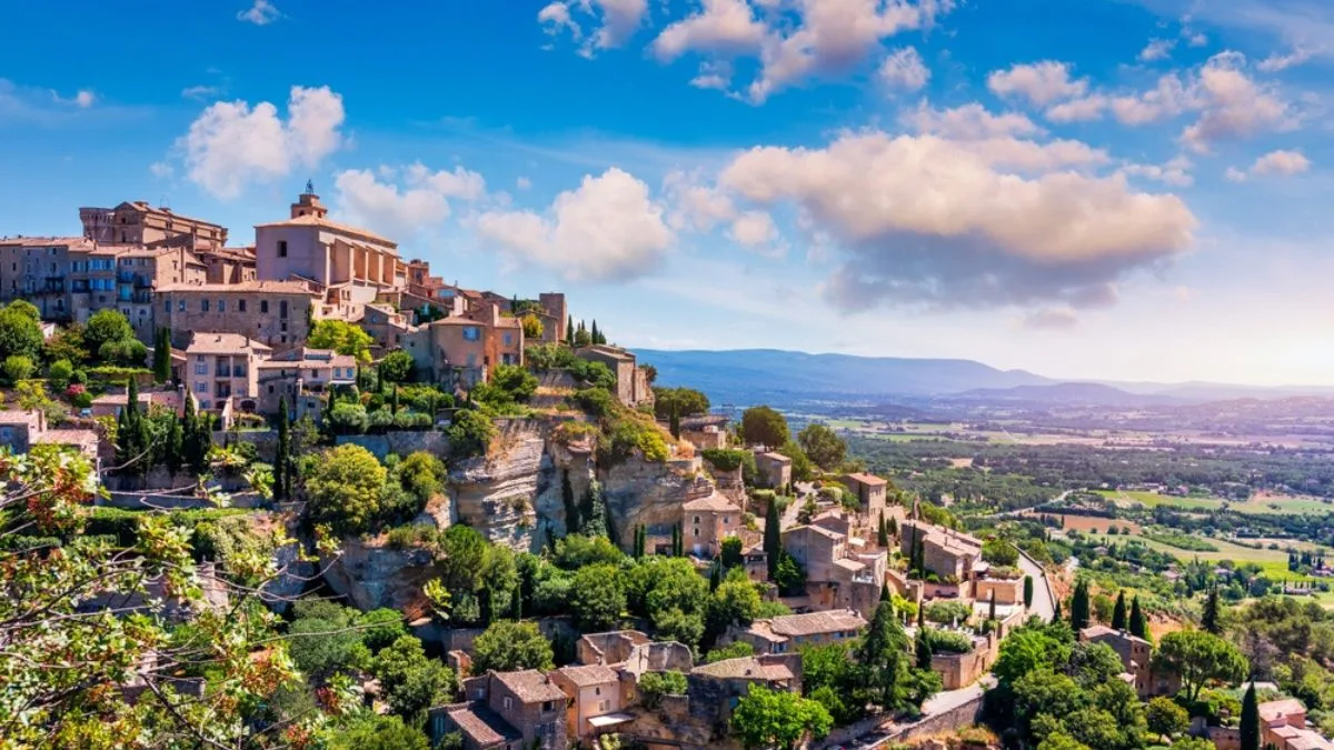 view on the village of Provencal village of Gordes with the Luberon countryside in the background