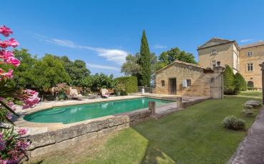 Magnificent XVIth century château. Saltwater pool. Walking distance to shops etc. 6 bedrooms to sleep 12 guests (UZES118GN)