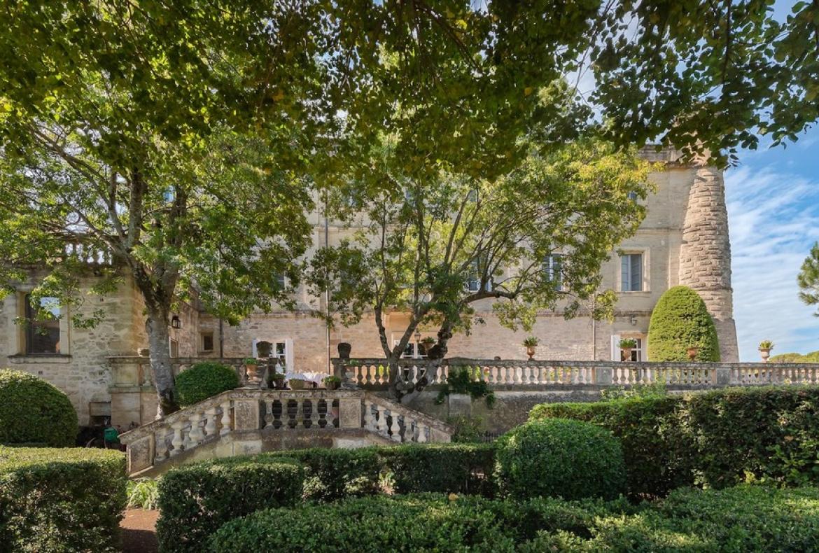 Magnificent XVIth century château. Saltwater pool. Walking distance to shops etc. 6 bedrooms to sleep 12 guests (UZES118GN)