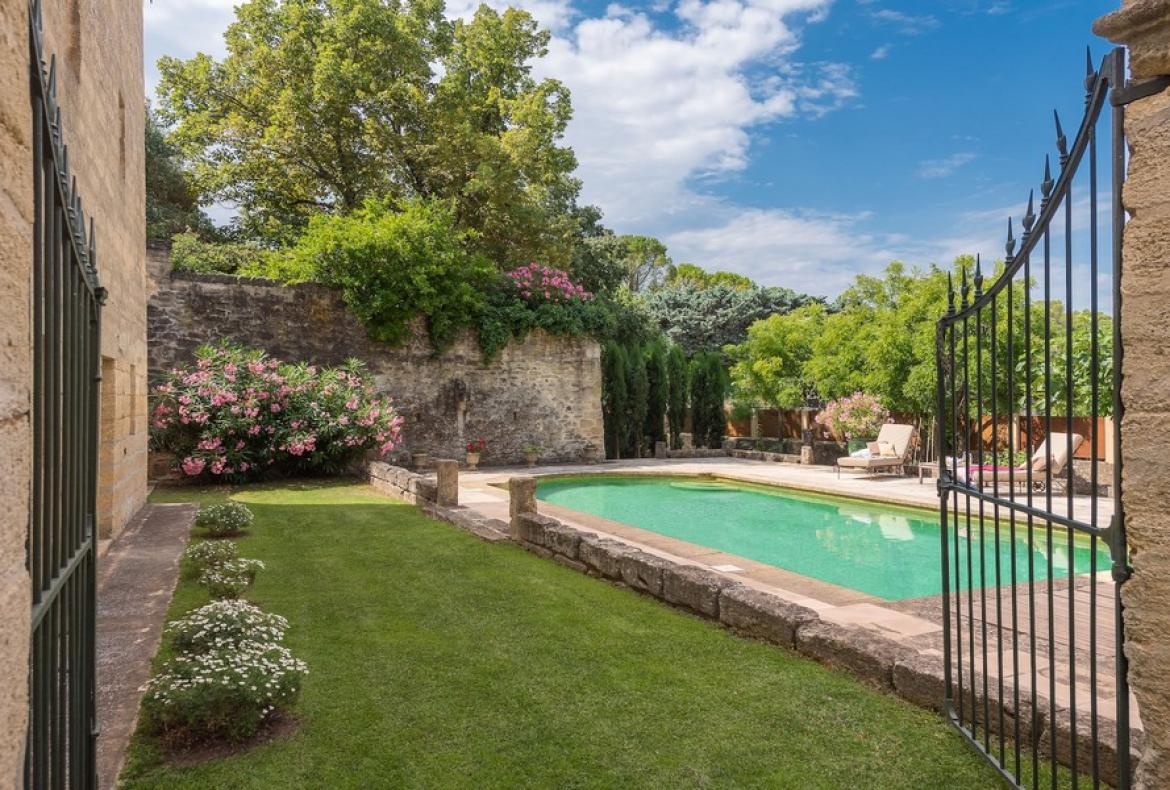 Magnificent XVIth century château. Saltwater pool. Walking distance to shops etc. 6 bedrooms to sleep 12 guests (UZES118GN)