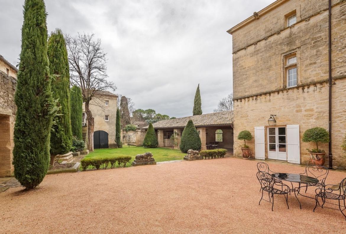 Magnificent XVIth century château. Saltwater pool. Walking distance to shops etc. 6 bedrooms to sleep 12 guests (UZES118GN)