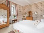 Magnificent XVIth century château. Saltwater pool. Walking distance to shops etc. 6 bedrooms to sleep 12 guests (UZES118GN)