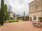 Magnificent XVIth century château. Saltwater pool. Walking distance to shops etc. 6 bedrooms to sleep 12 guests (UZES118GN)